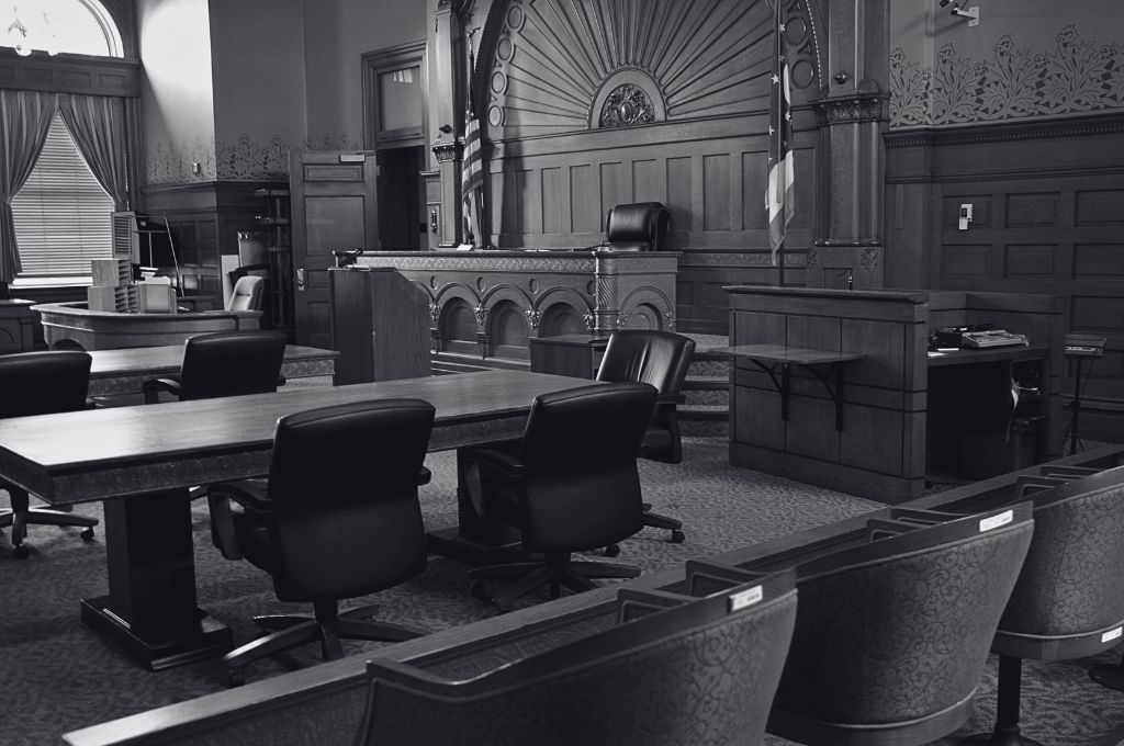 Reveille Advisors offers law firms and their clients with comprehensive litigation support and intelligence. This is a picture of a courtroom where a jury trial will take place.